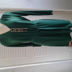 Michael Kors Green with Gold tone accessories.